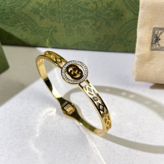 Gucci Interlocking G Round Crystal Medallion Filigree Cuff Bracelet