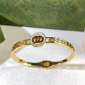 Gucci Interlocking G Round Crystal Medallion Filigree Cuff Bracelet