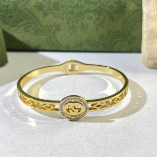 Gucci Interlocking G Round Crystal Medallion Filigree Cuff Bracelet