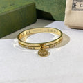 Gucci Interlocking G Hanging Medallion Pavé Cuff Bracelet