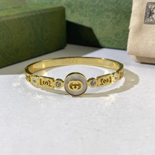 Gucci Round Interlocking G Crystal Bezel Charm Cuff Bracelet