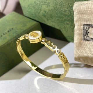 Gucci Round Interlocking G Crystal Bezel Charm Cuff Bracelet