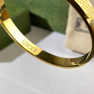 Gucci Textured GG Pattern Crystal Accent Slim Cuff Bracelet