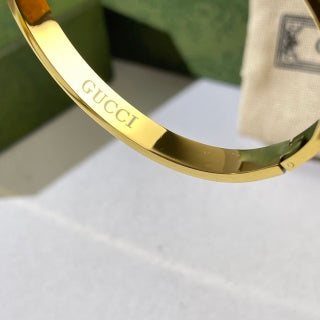 Gucci Web Stripe Interlocking G Engraved Plaque Cuff Bracelet