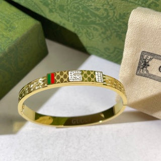 Gucci Web Stripe Interlocking G Engraved Plaque Cuff Bracelet