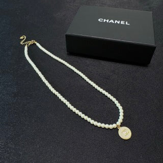 Chanel Pearl and Round Pendant Necklace