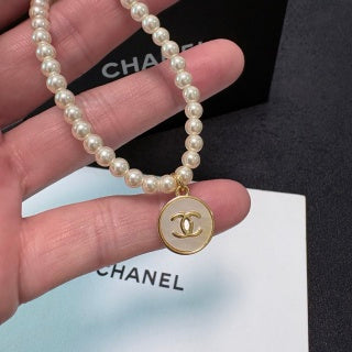 Chanel Pearl and Round Pendant Necklace