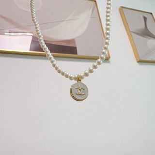 Chanel Pearl and Round Pendant Necklace