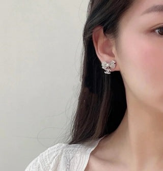 CHANEL Graceful Bow Charm Stud Earrings