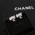CHANEL Graceful Bow Charm Stud Earrings