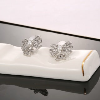 CHANEL Graceful Bow Charm Stud Earrings