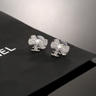 CHANEL Graceful Bow Charm Stud Earrings