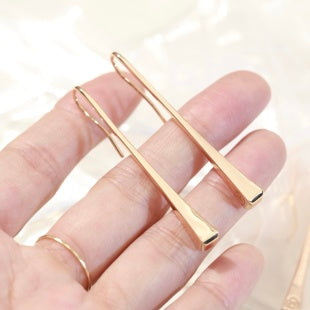 Hermès Rose Gold Linear Drop Stud Earrings