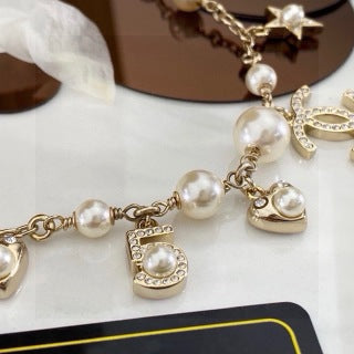 Chanel Romantic Pearl Charm Bracelet