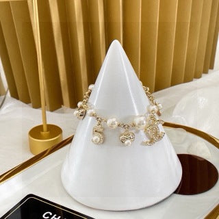 Chanel Romantic Pearl Charm Bracelet