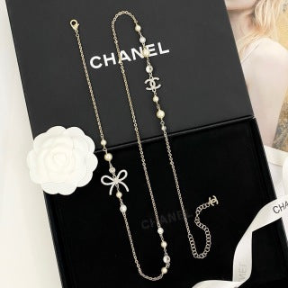 Chanel Elegant Ribbon Pearl Charm Necklace