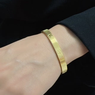CARTIER Marvion Textured Screw Bangle