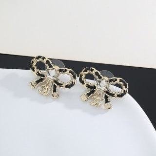 Chanel Crystal Bow Charm Earrings – Elegant Luxury Fashion Jewelry