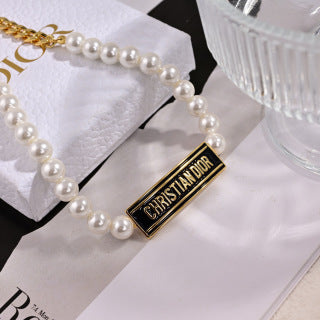 Dior Liora Pearl Ribbon Plate Necklace