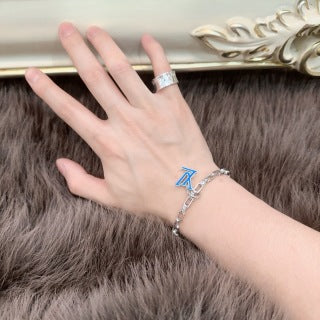 Louis Vuitton Monogram Tag Link Bracelet