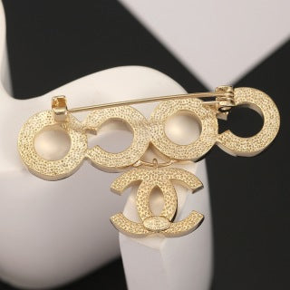 Chanel Geometric Circle Signature Brooch