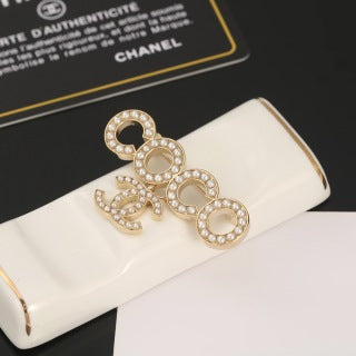 Chanel Geometric Circle Signature Brooch