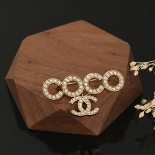 Chanel Geometric Circle Signature Brooch