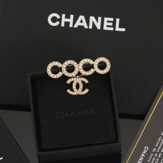 Chanel Geometric Circle Signature Brooch