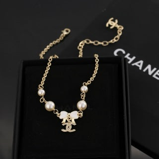 Chanel Pearl Bow Charm Necklace
