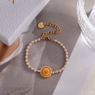 Dior Liora Pearl CD Medallion Charm Bracelet