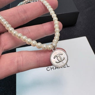 Chanel Pearl Medallion Pendant Necklace