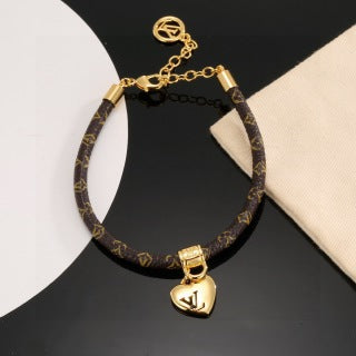 Louis Vuitton Heart Charm Monogram Cord Bracelet