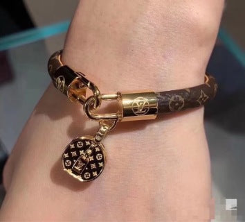 Louis Vuitton Monogram Leather Charm Bracelet
