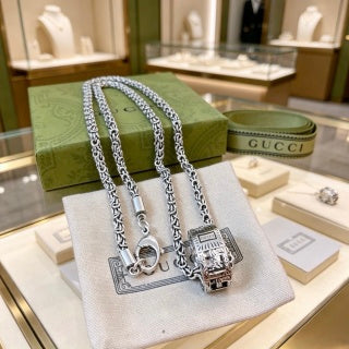 Gucci Engraved Horsebit Barrel Pendant Long Necklace