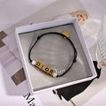 Dior Liora Pearl Letter Cord Bracelet