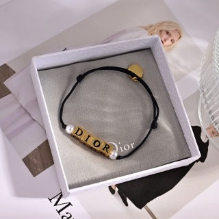 Dior Liora Pearl Letter Cord Bracelet