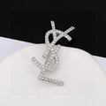 YSL Cassandre Crystal Monogram Brooch
