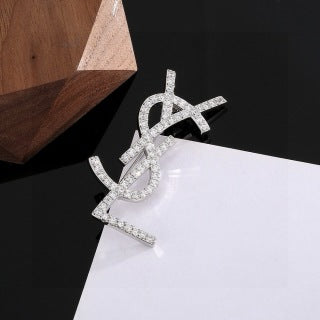 YSL Cassandre Crystal Monogram Brooch