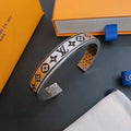 Louis Vuitton Monogram Heritage Cuff Bracelet
