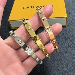 Louis Vuitton Iconic Studded Lock Cuff Bracelet
