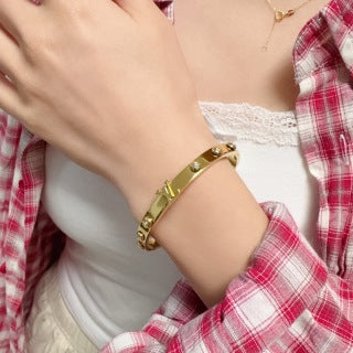 Louis Vuitton Iconic Studded Lock Cuff Bracelet