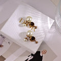 Dior Celestial Pearl Star Earrings