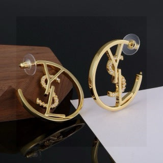YSL Cassandre Sculptural Hoop Earrings