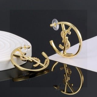 YSL Cassandre Sculptural Hoop Earrings