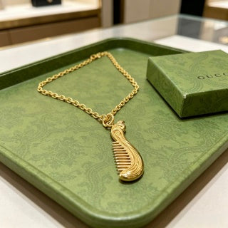 Gucci GG Ribbed Drop Pendant Gold Chain Necklace
