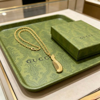 Gucci GG Ribbed Drop Pendant Gold Chain Necklace