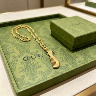 Gucci GG Ribbed Drop Pendant Gold Chain Necklace