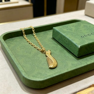 Gucci GG Ribbed Drop Pendant Gold Chain Necklace