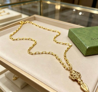 Gucci GG Engraved Spike Drop Gold Pendant Necklace