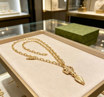 Gucci GG Engraved Spike Drop Gold Pendant Necklace